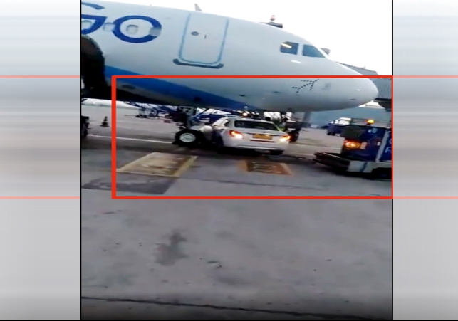 A Car under Indigo Plane at Delhi Airport