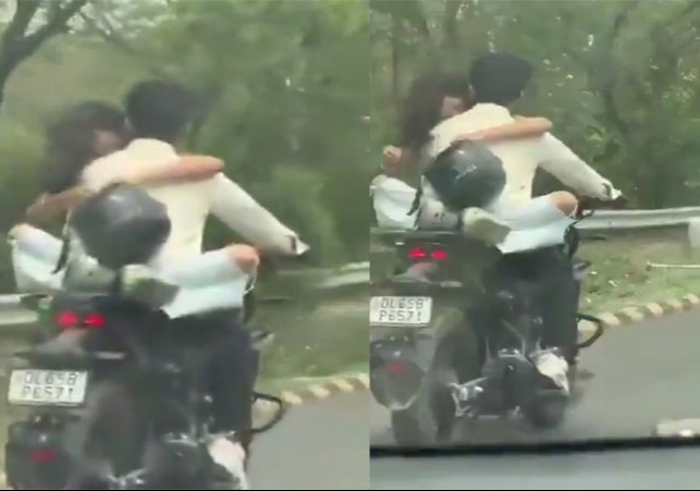 Noida Couple Bike Romance Viral Video Traffic Police Challan Rs 53500