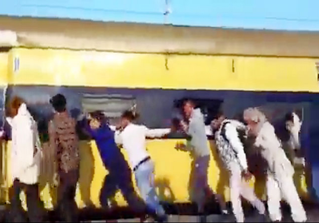 Passengers Push the Train near Meerut