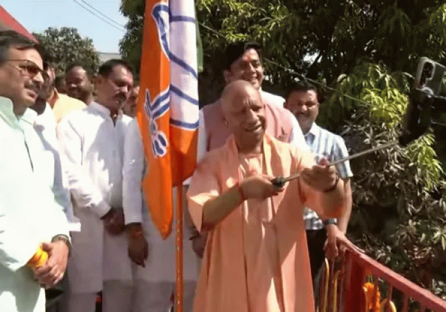 CM Yogi Hoists Party Flag in Gorakhpur