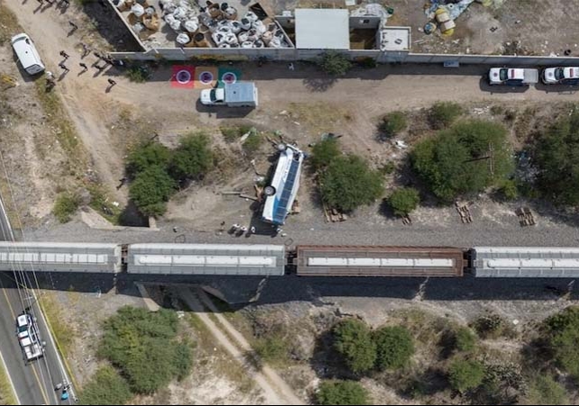 Train crashes into bus at crossing in Mexico killing 7 and injuring 17