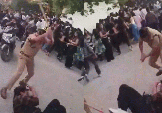 Dehradun: Policeman rains blows on youth with a baton