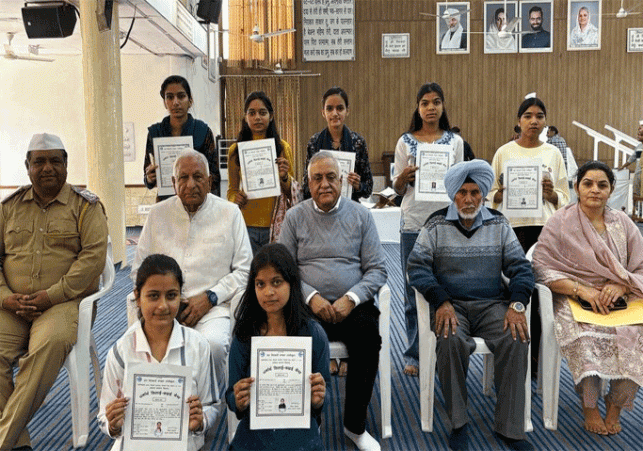 Certificates awarded to the passed students at the Sewing and Embroidery Center of Sant Nirankari Mi