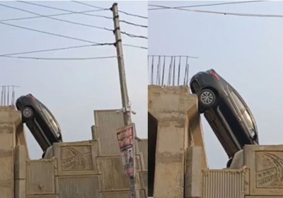 Car Hanging from an Under-Construction Flyover