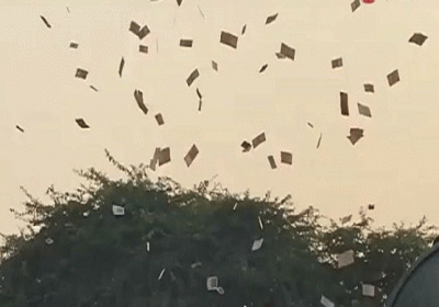 Man Throws Money From Flyover