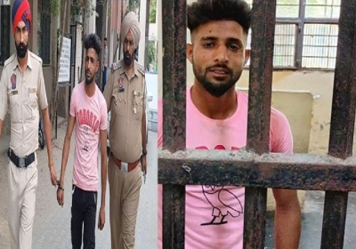 a young man a pistol in front of the judge in the court in Jalandhar Punjab