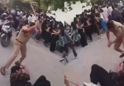 Dehradun: Policeman rains blows on youth with a baton