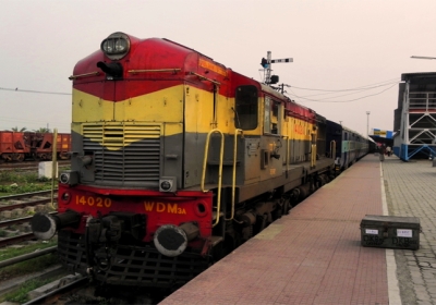 Why non stop train slow before reach on railway platform 